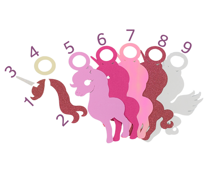 a group of pink and purple unicorns with numbers on them