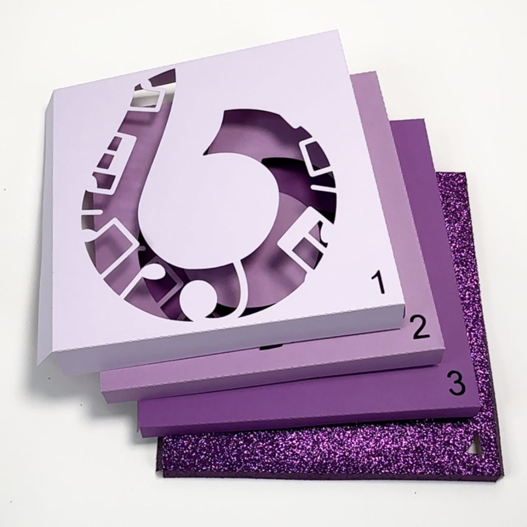 a purple box with a number six cut out of it