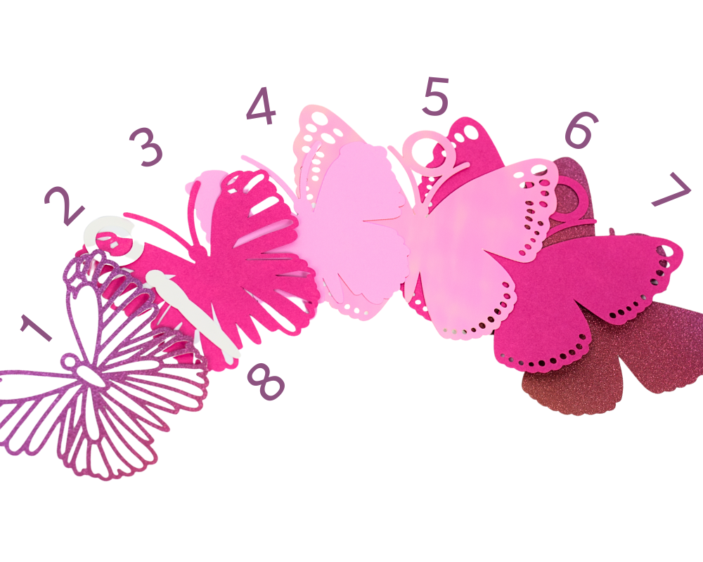 a number of pink and purple butterflies on a white background