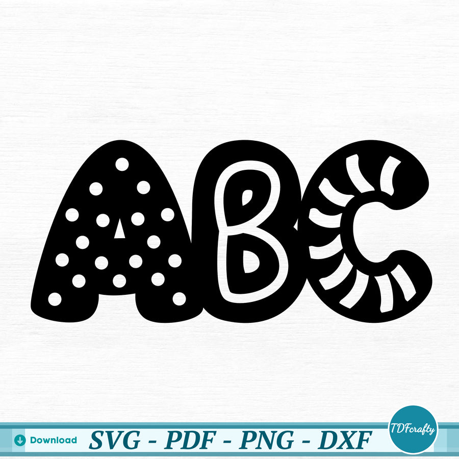 a black and white alphabet with polka dots